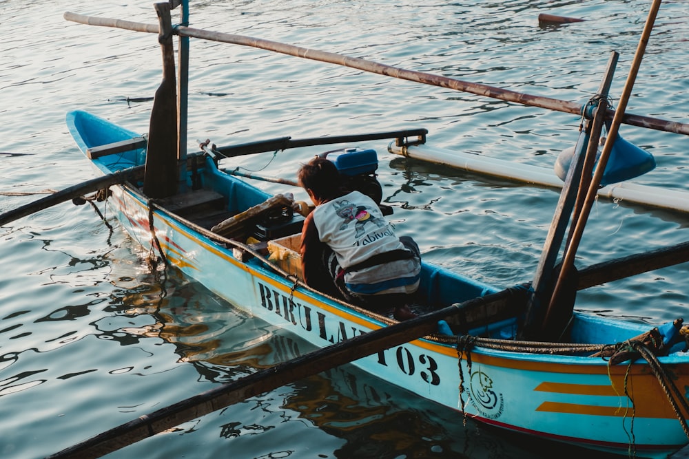 a couple of people on a boat