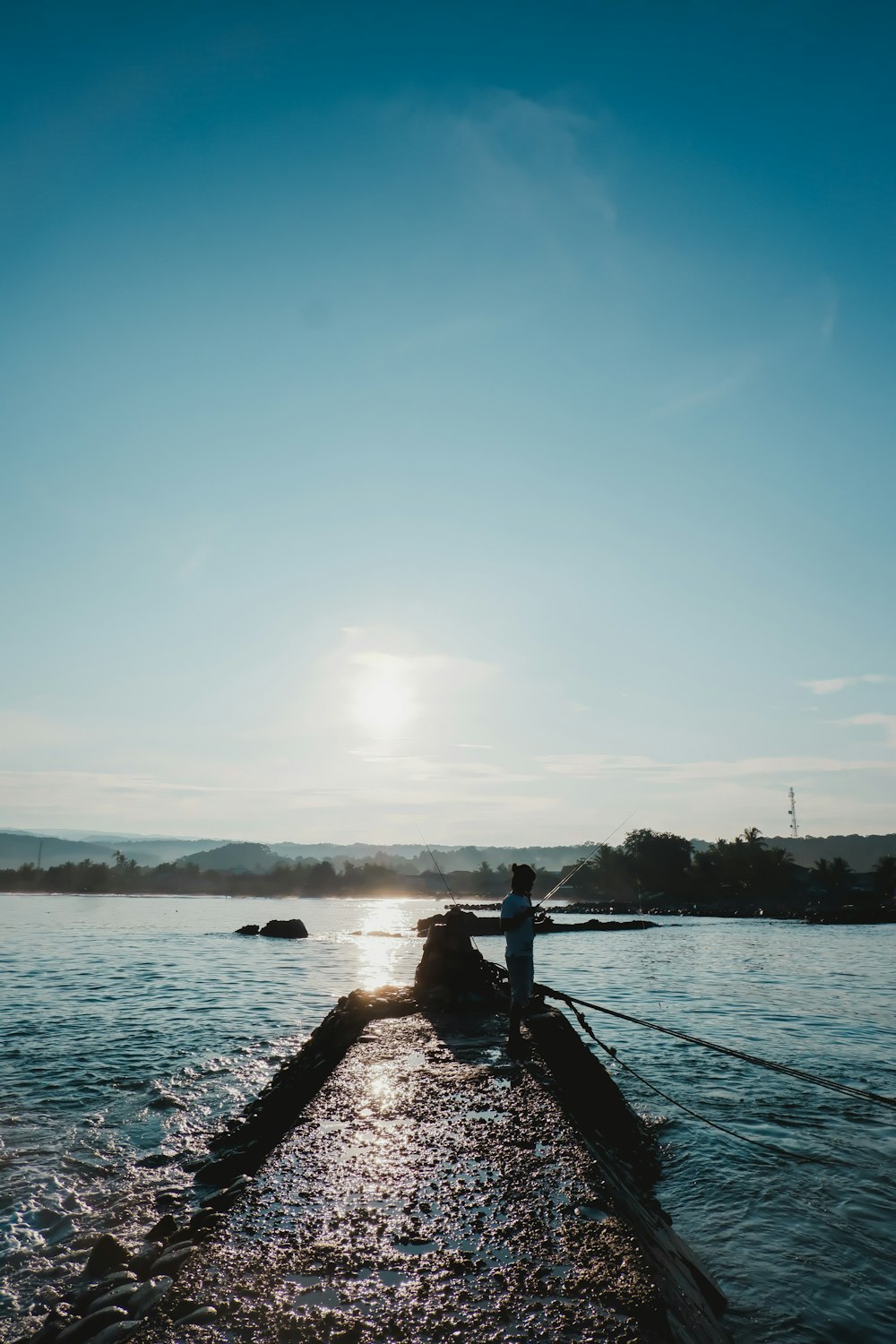 a person standing on a dock