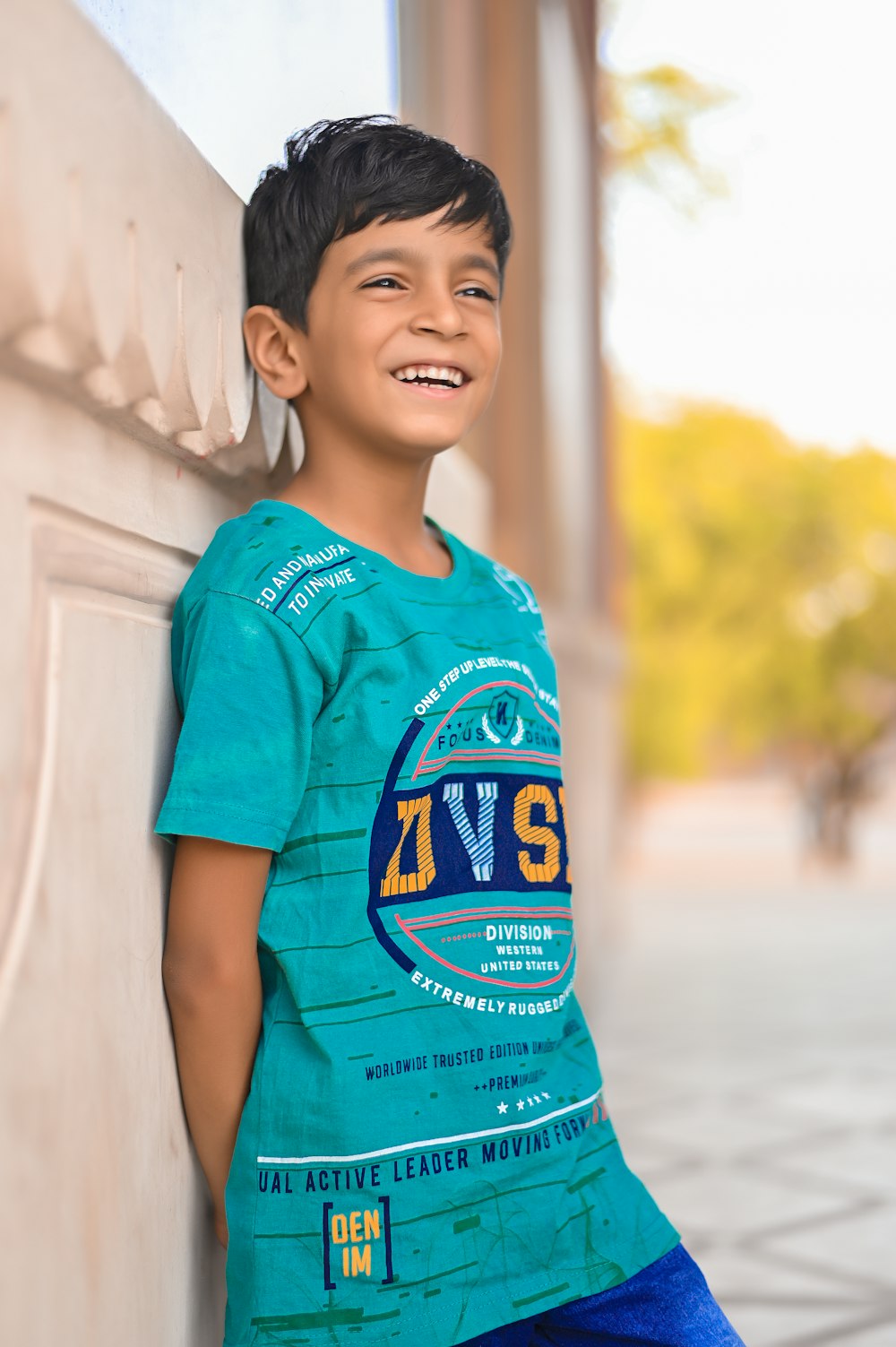 a boy smiling for the camera