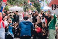 A group photo of the trust visa overseas team celebrating a successful visa approval.