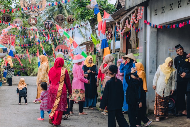 A vibrant traditional Turkish village festival with people dancing in colorful costumes