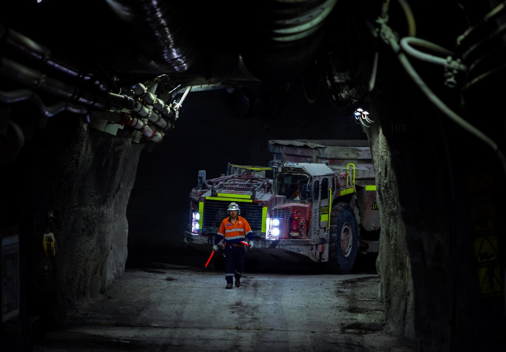 a person standing in a tunnel