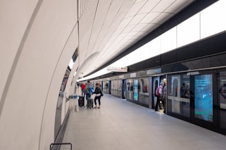 A sleek luggage locker station with NYC skyline in the background during golden hour.