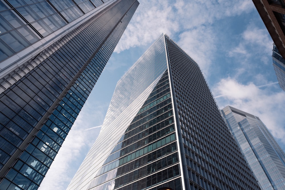 looking up at tall buildings