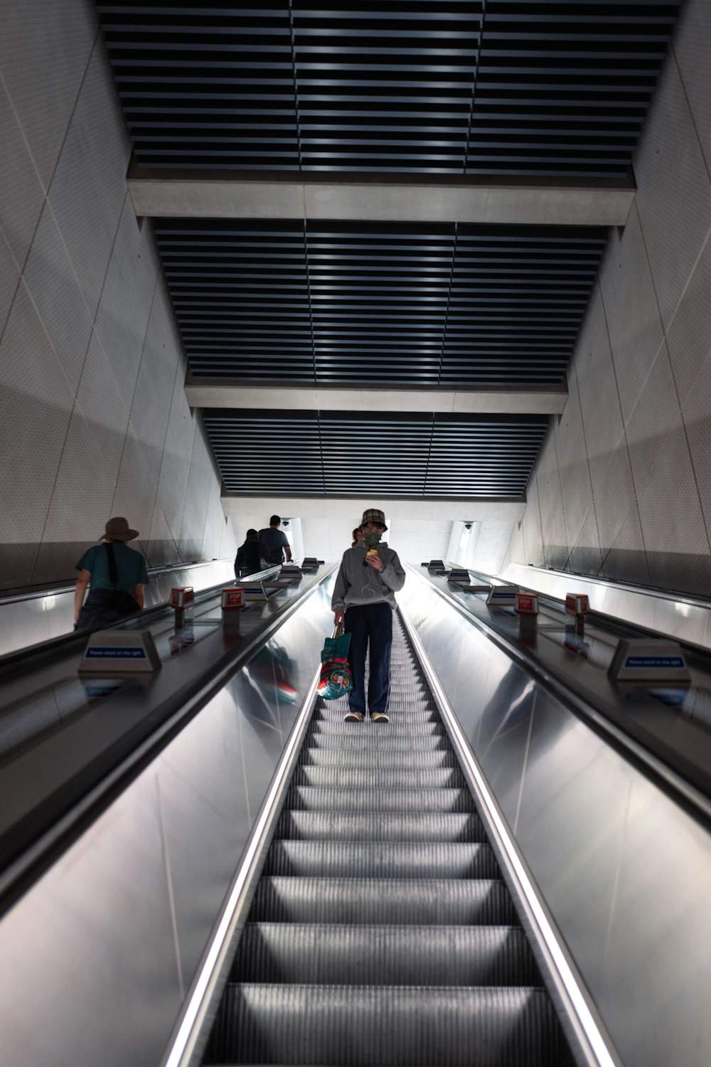 people walking on a flight of stairs