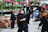 Group of international students participating in a traditional Thai greeting workshop outdoors