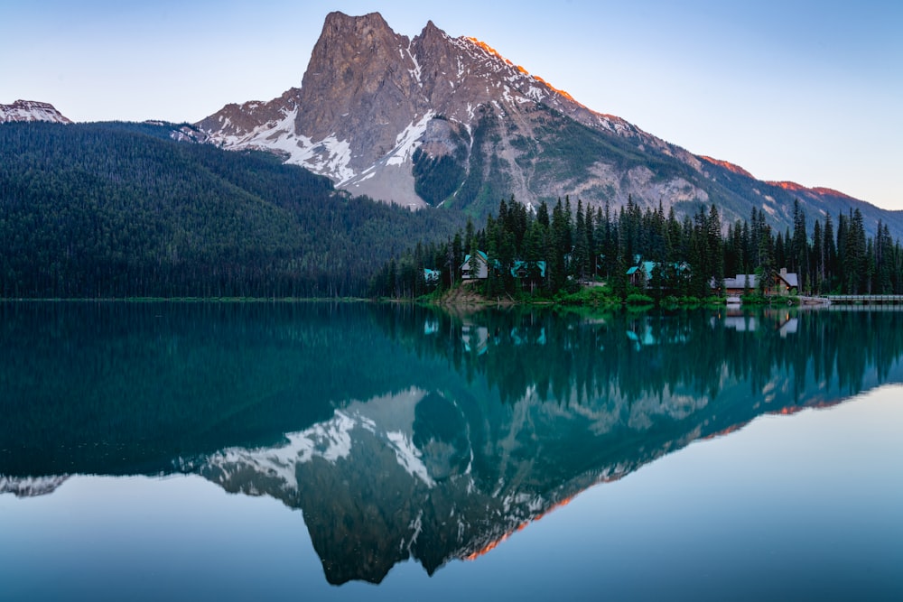 a lake with a mountain in the background