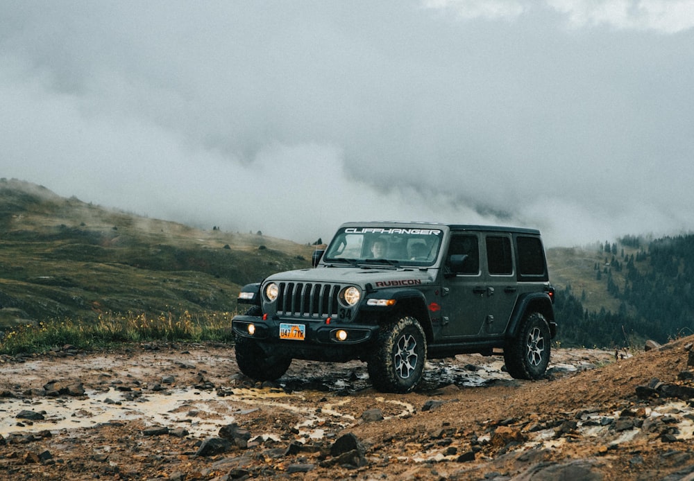 a car parked on a dirt road