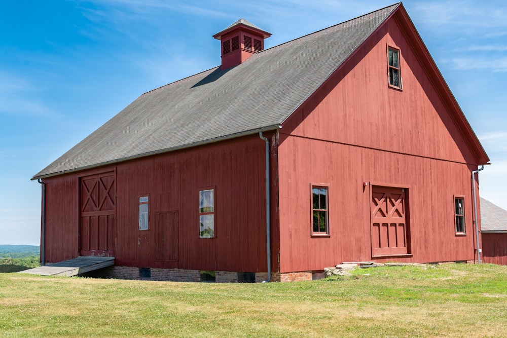 a barn with a red roof