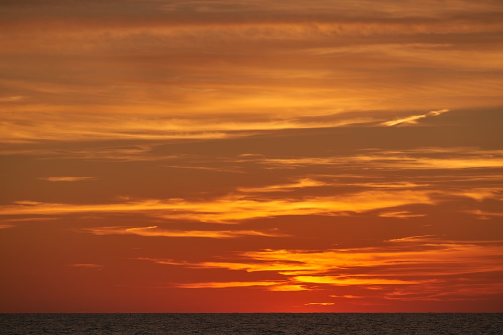 a sunset over the ocean