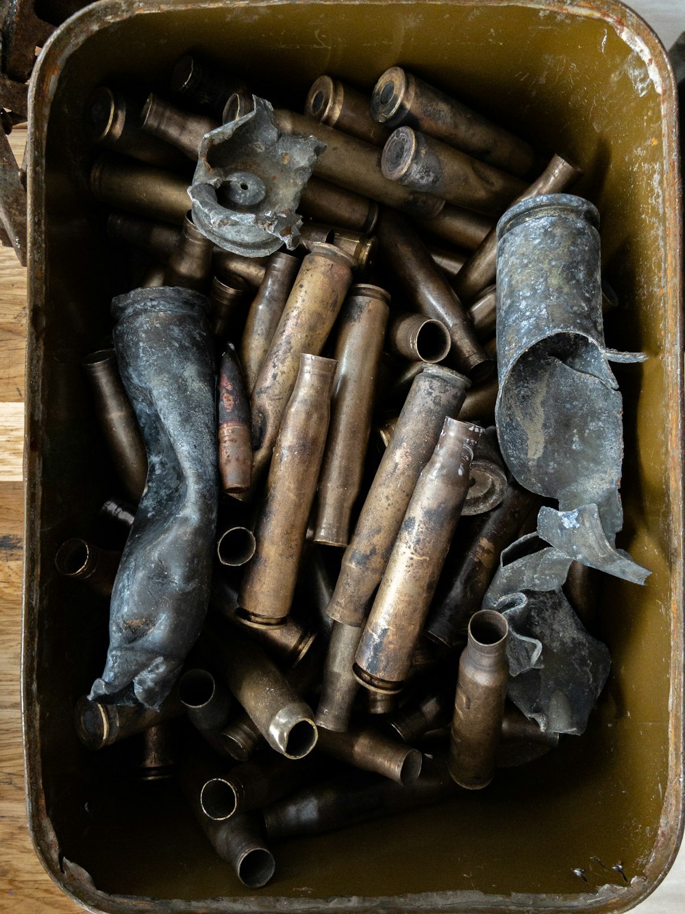 a metal container with bullets