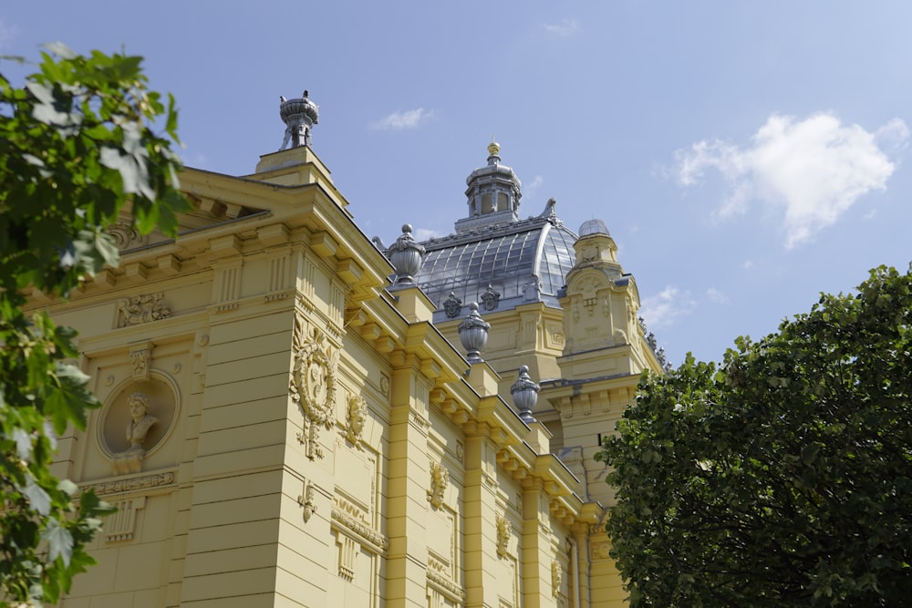 a building with a statue on top