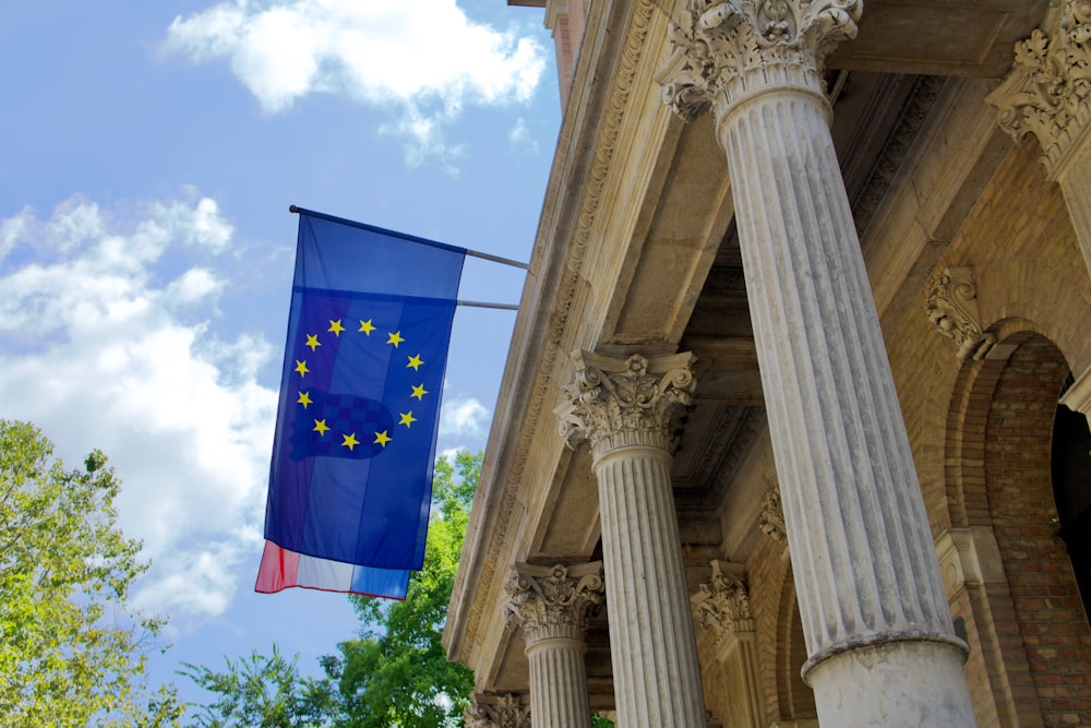 a flag on a pillar