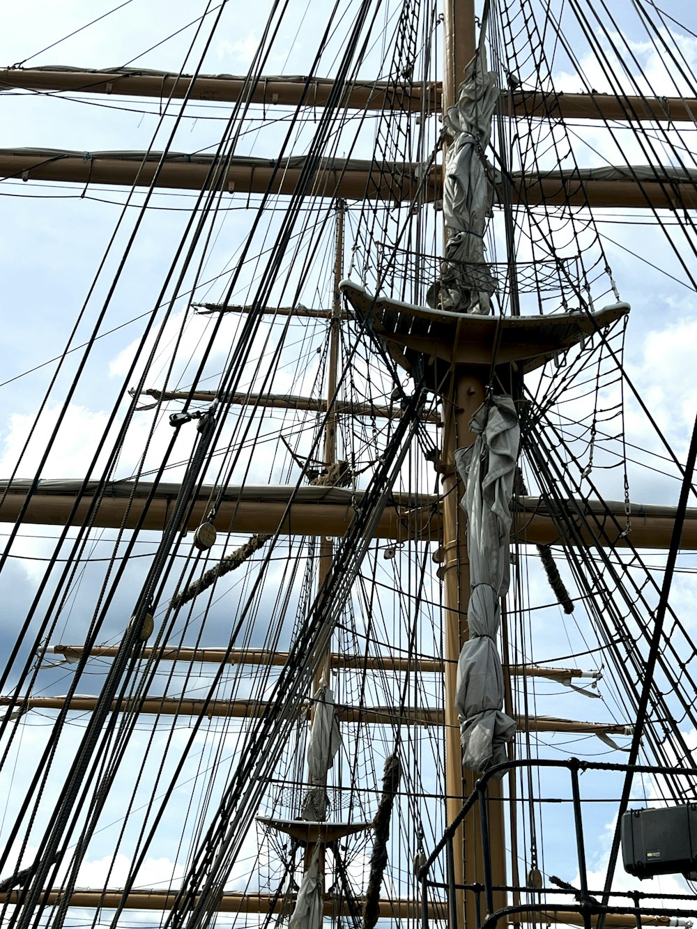 a large sailboat with many masts