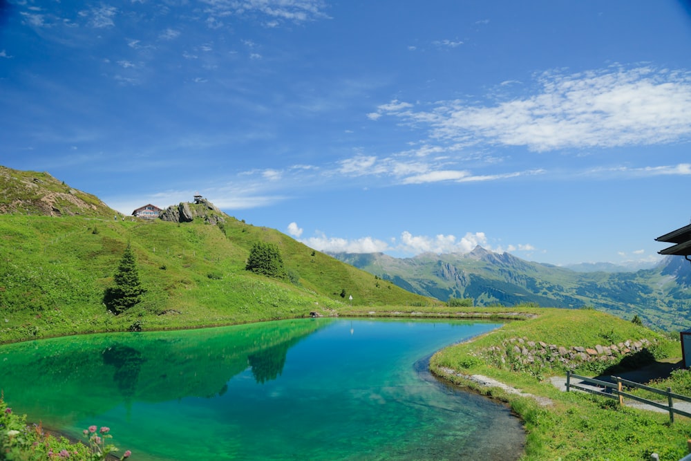 a body of water surrounded by hills