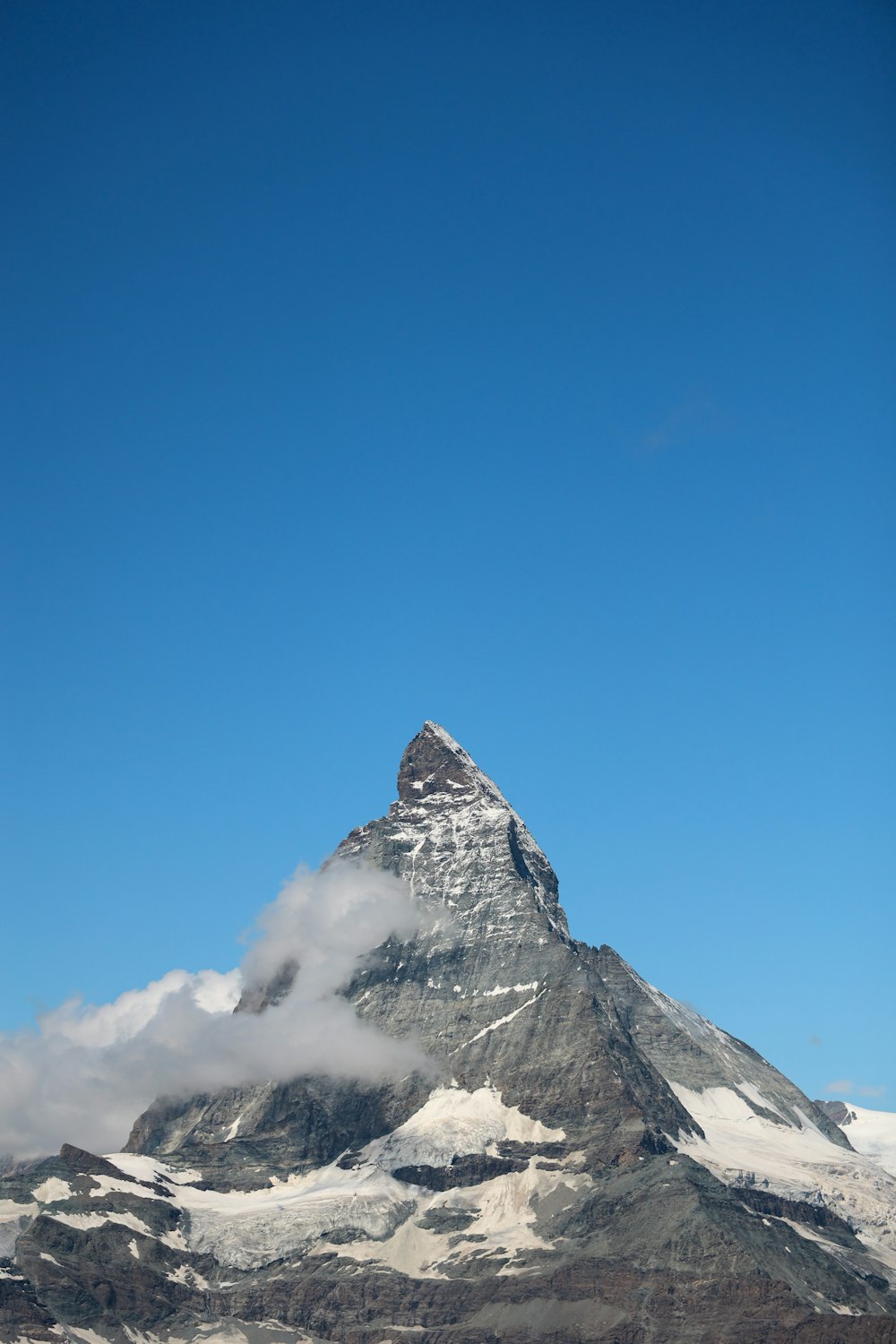 a mountain with snow