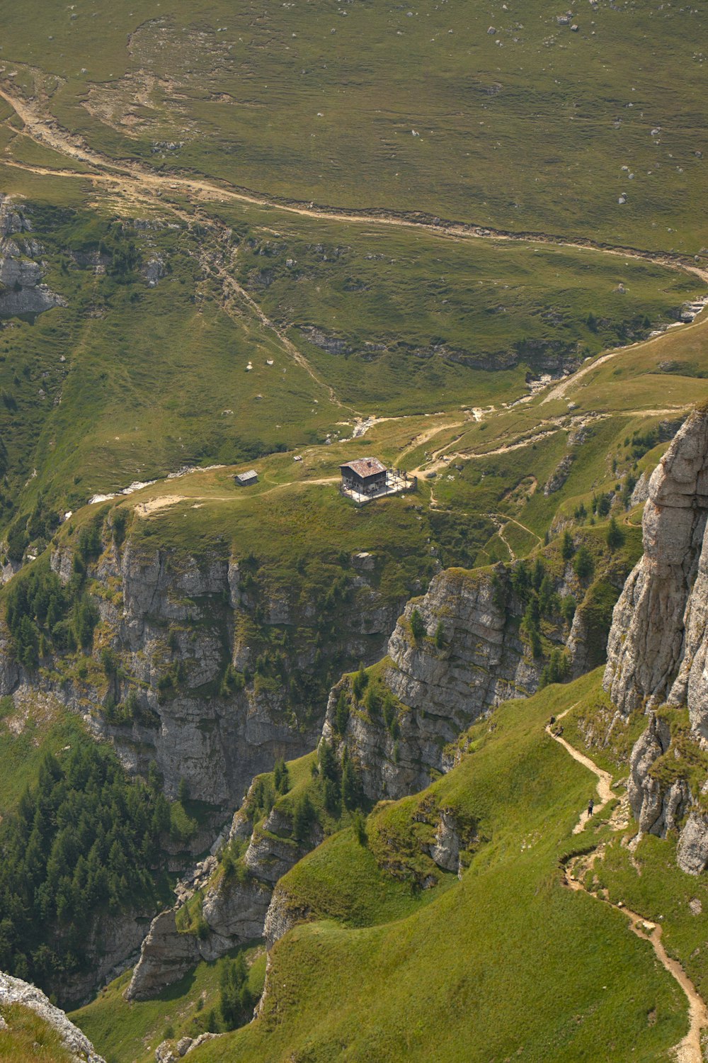 a rocky landscape with a river running through it