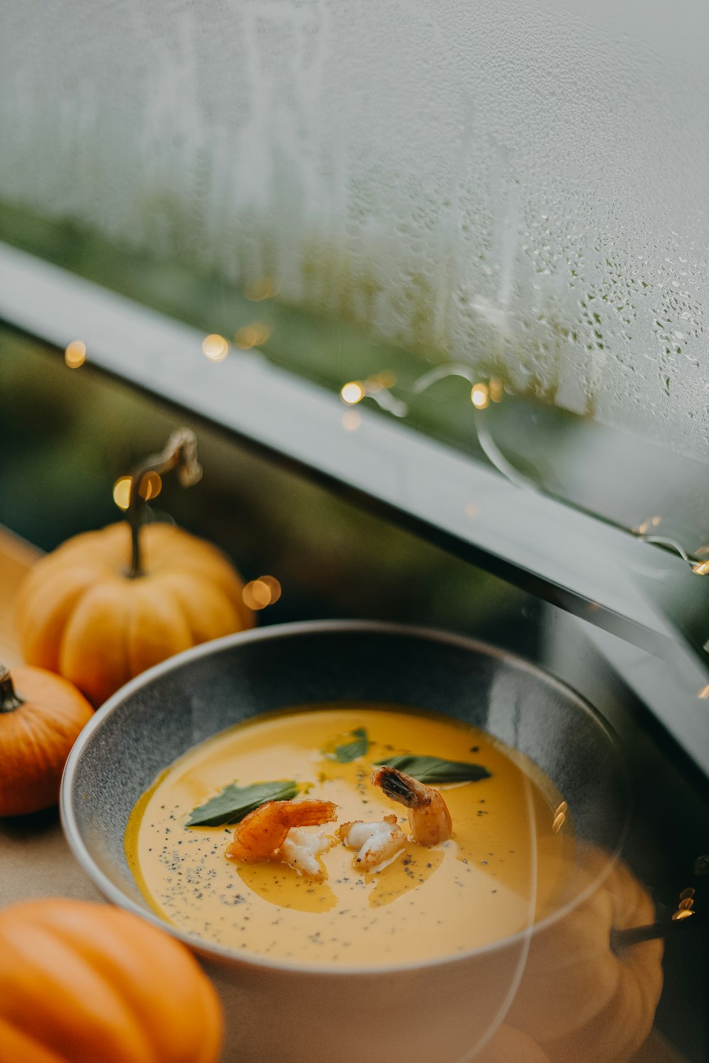 a bowl of soup with a spoon