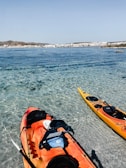 a person in a kayak on the water