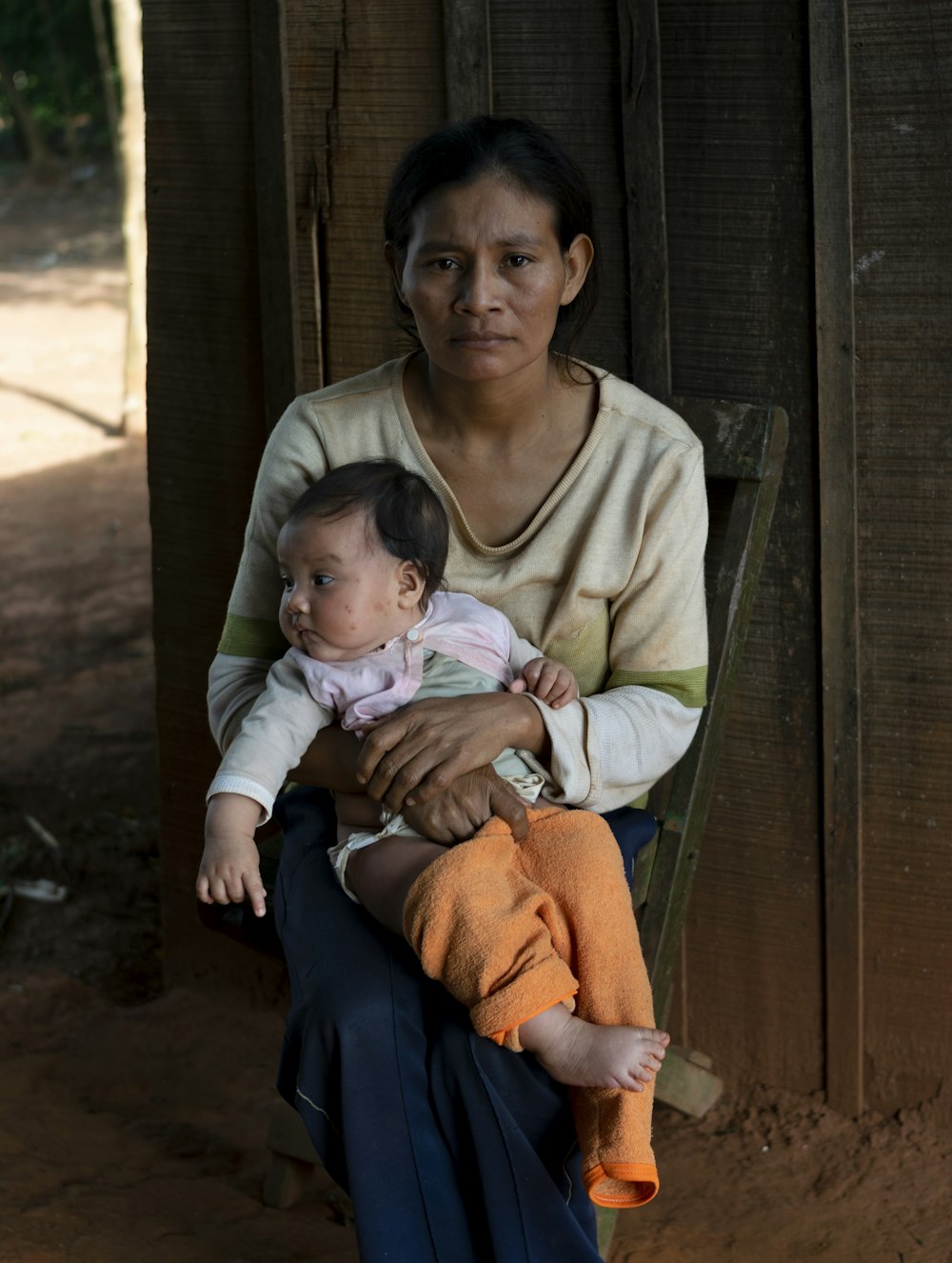 a person holding a baby