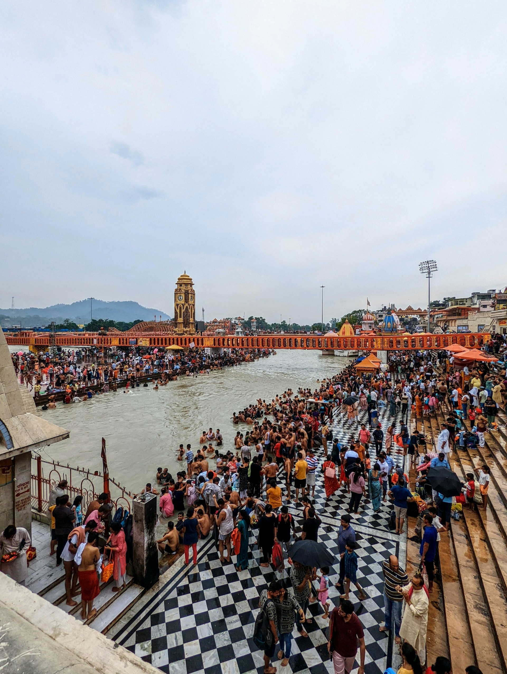 a crowd of people on a dock