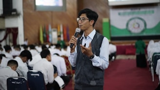 a man speaking into a microphone