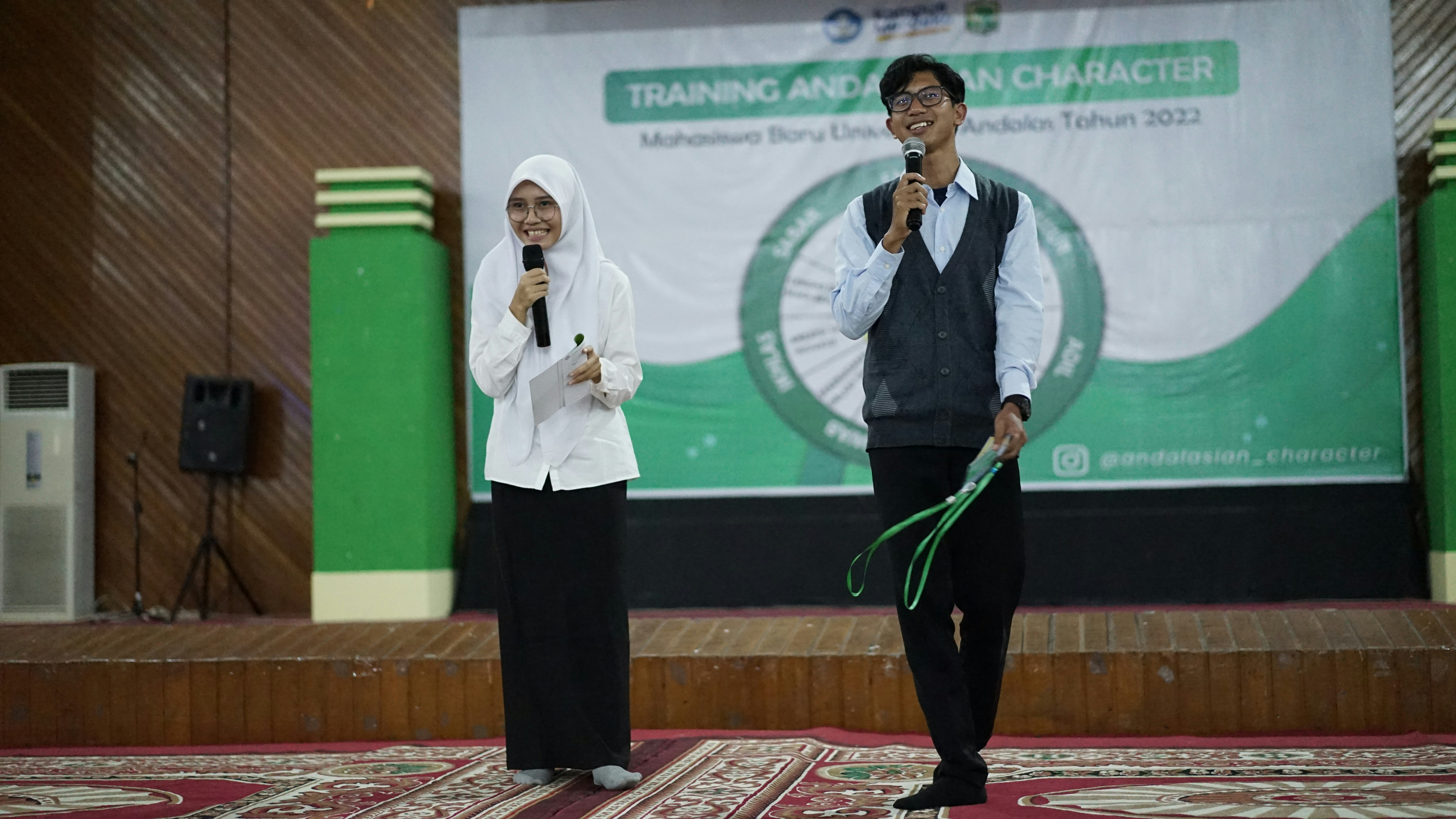 a man and woman on a stage