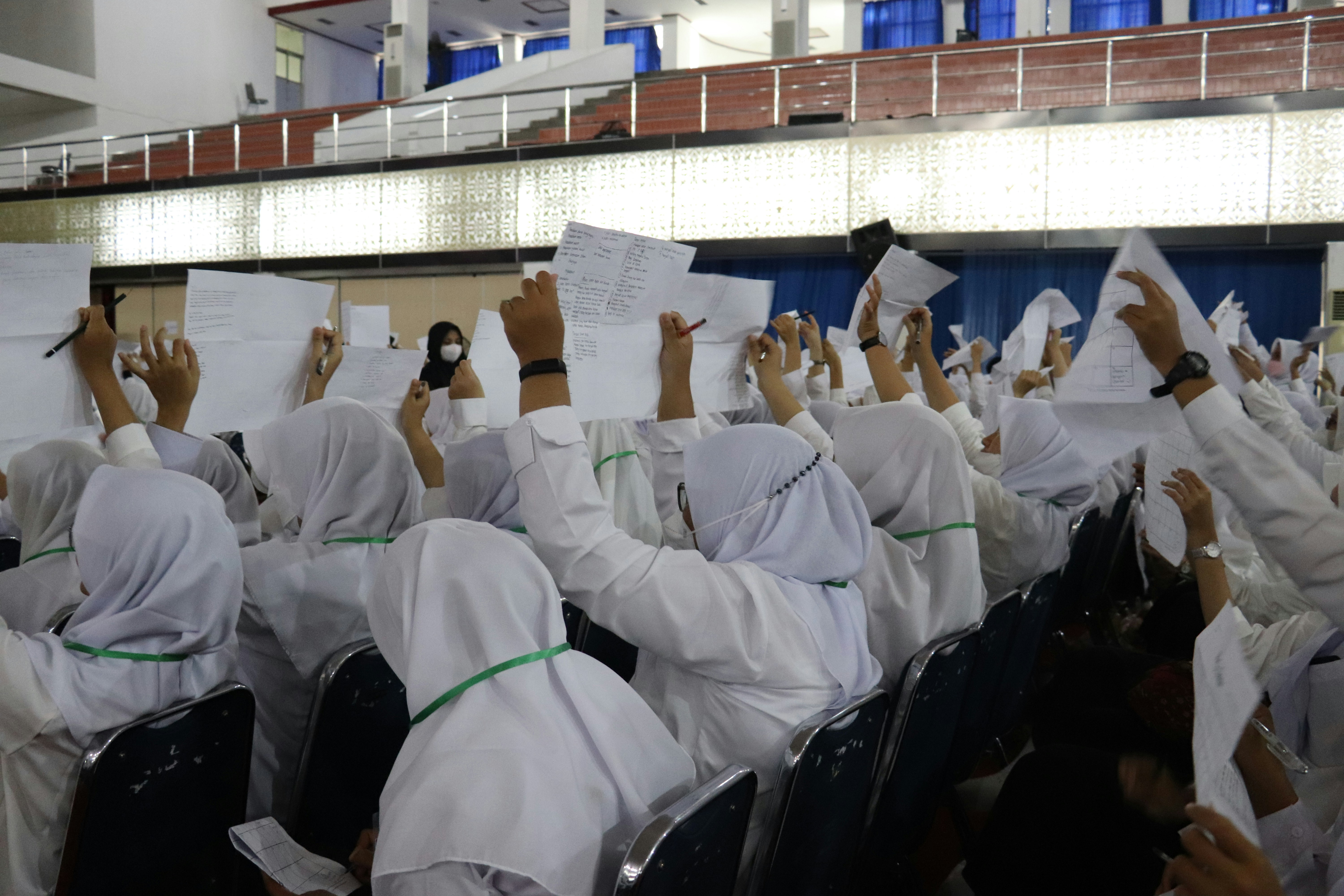 Group of people in white robes