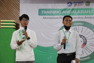 a couple of men holding microphones