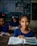 a few young girls in a classroom
