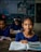 a few young girls in a classroom