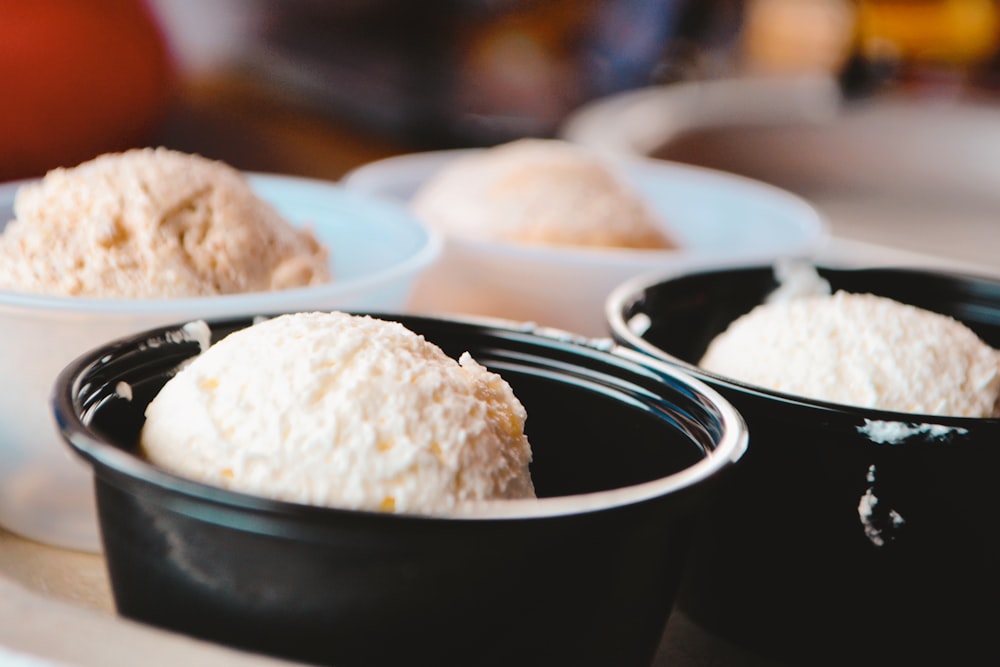 a bowl of rice and a plate of food