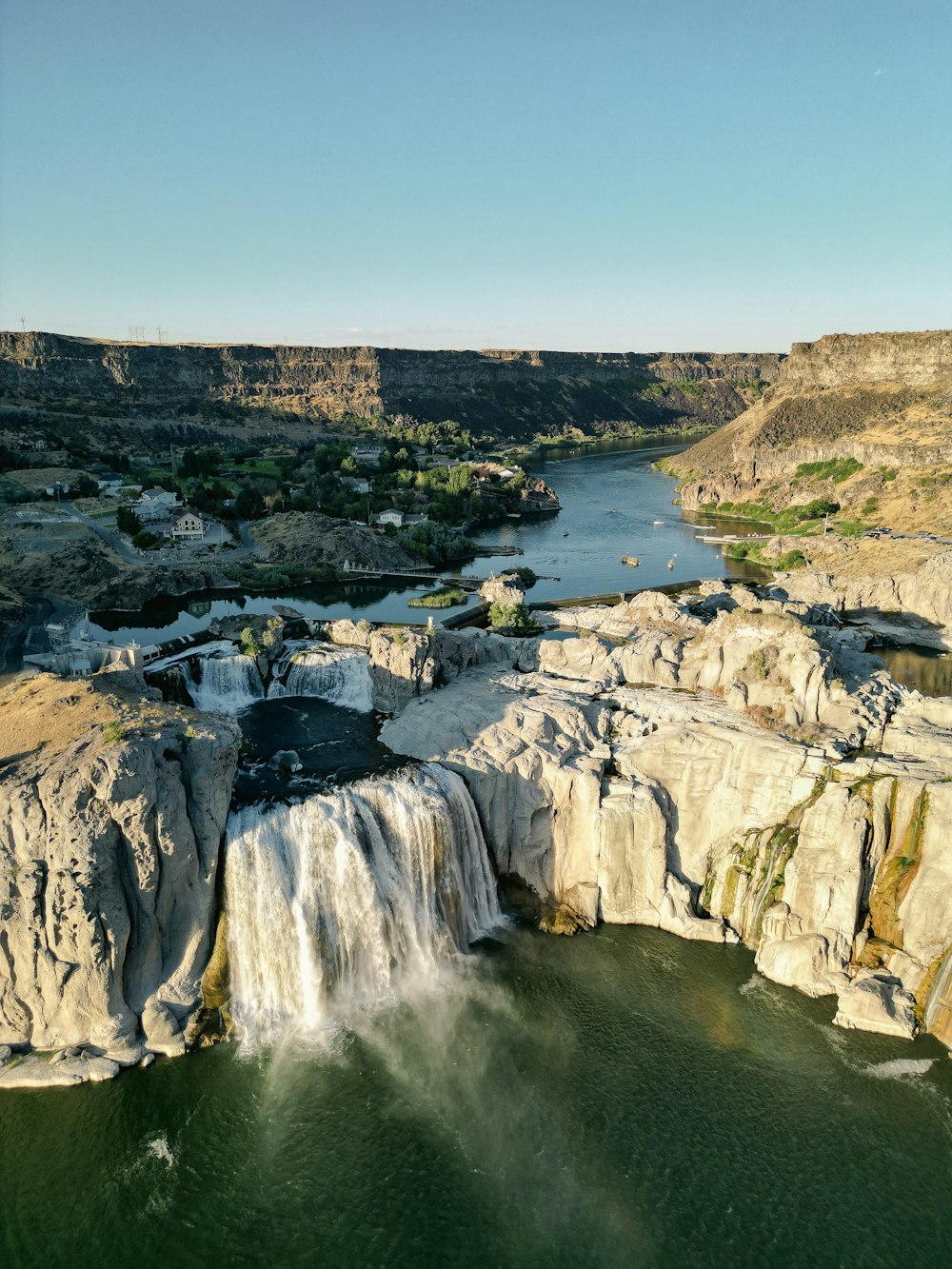 a waterfall over a cliff