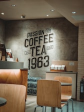 a room with chairs and a sign