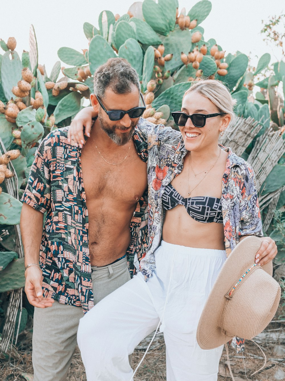 a man and woman posing for a picture