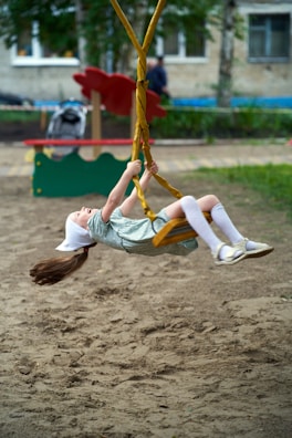 a person doing a handstand on a beach