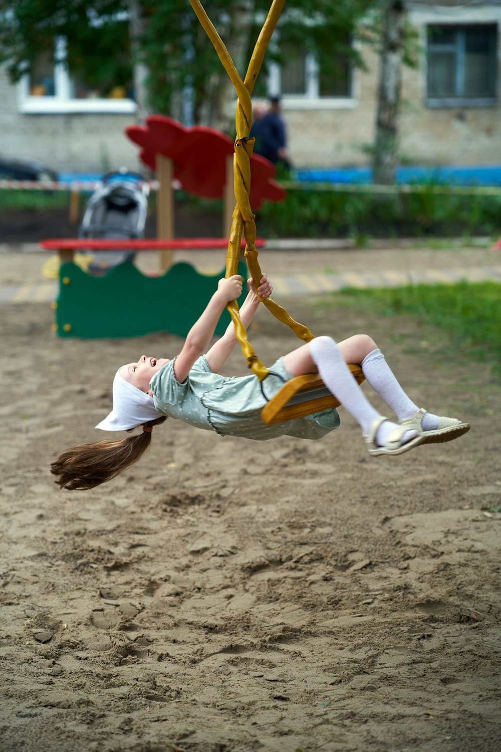 a person doing a handstand on a beach