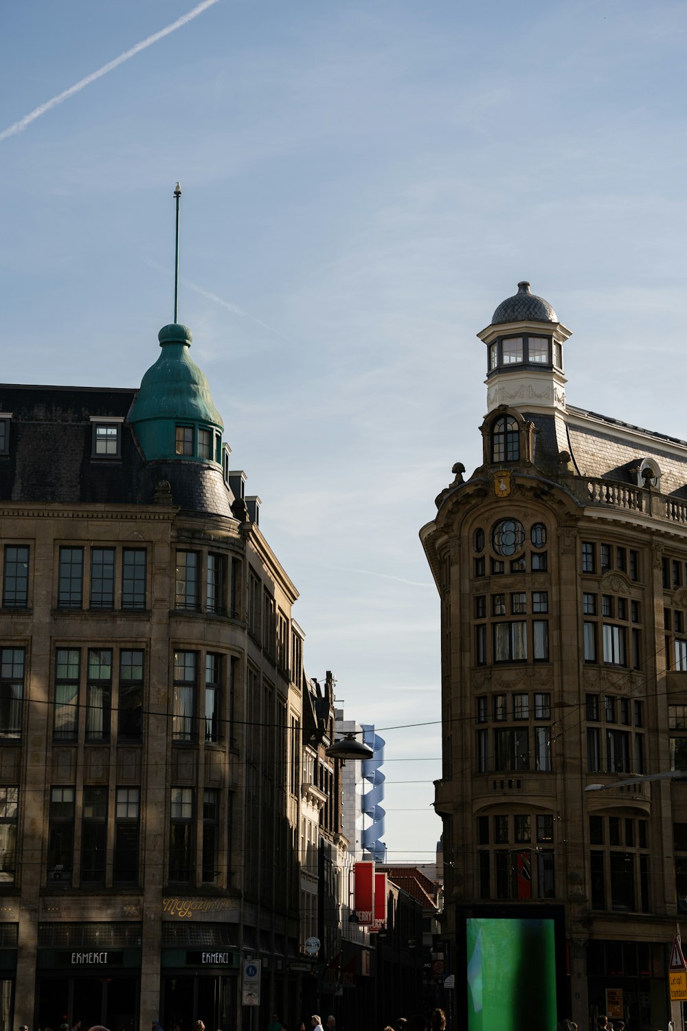 a group of buildings with a blue sky