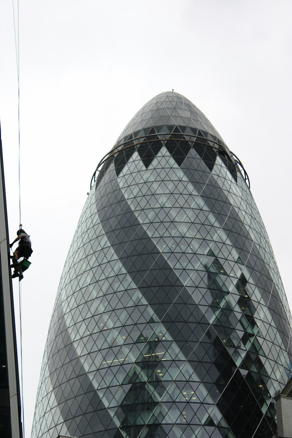 a tall building with a glass front