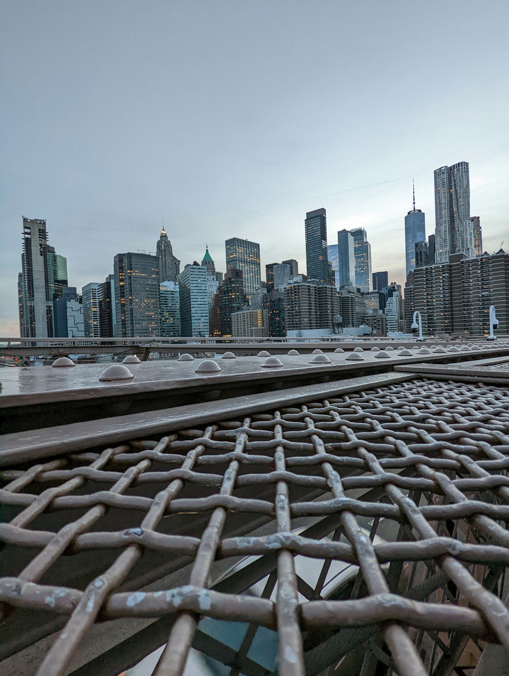 a city skyline with a bridge