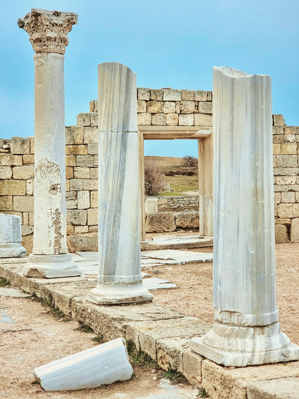 a group of pillars in a stone building