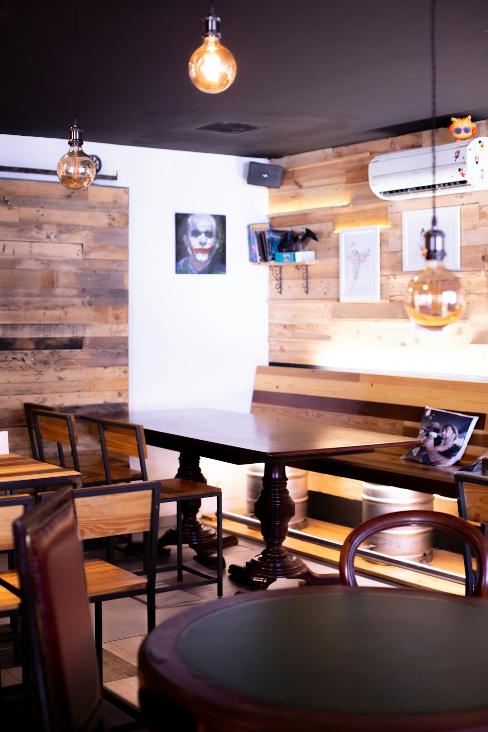 a bar with a table and chairs