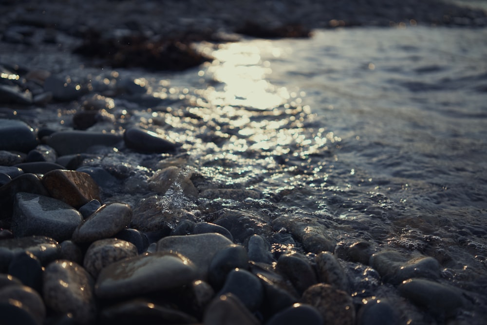 a rocky beach with waves crashing