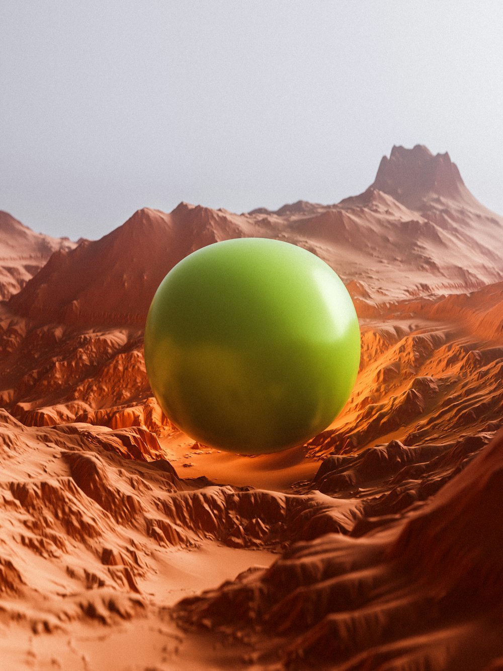 a green apple on a mountain