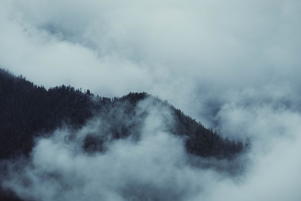 a mountain covered in clouds