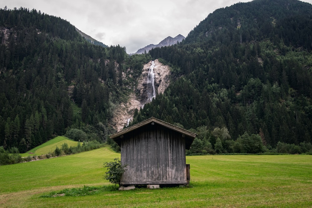 a house with a mountain in the background