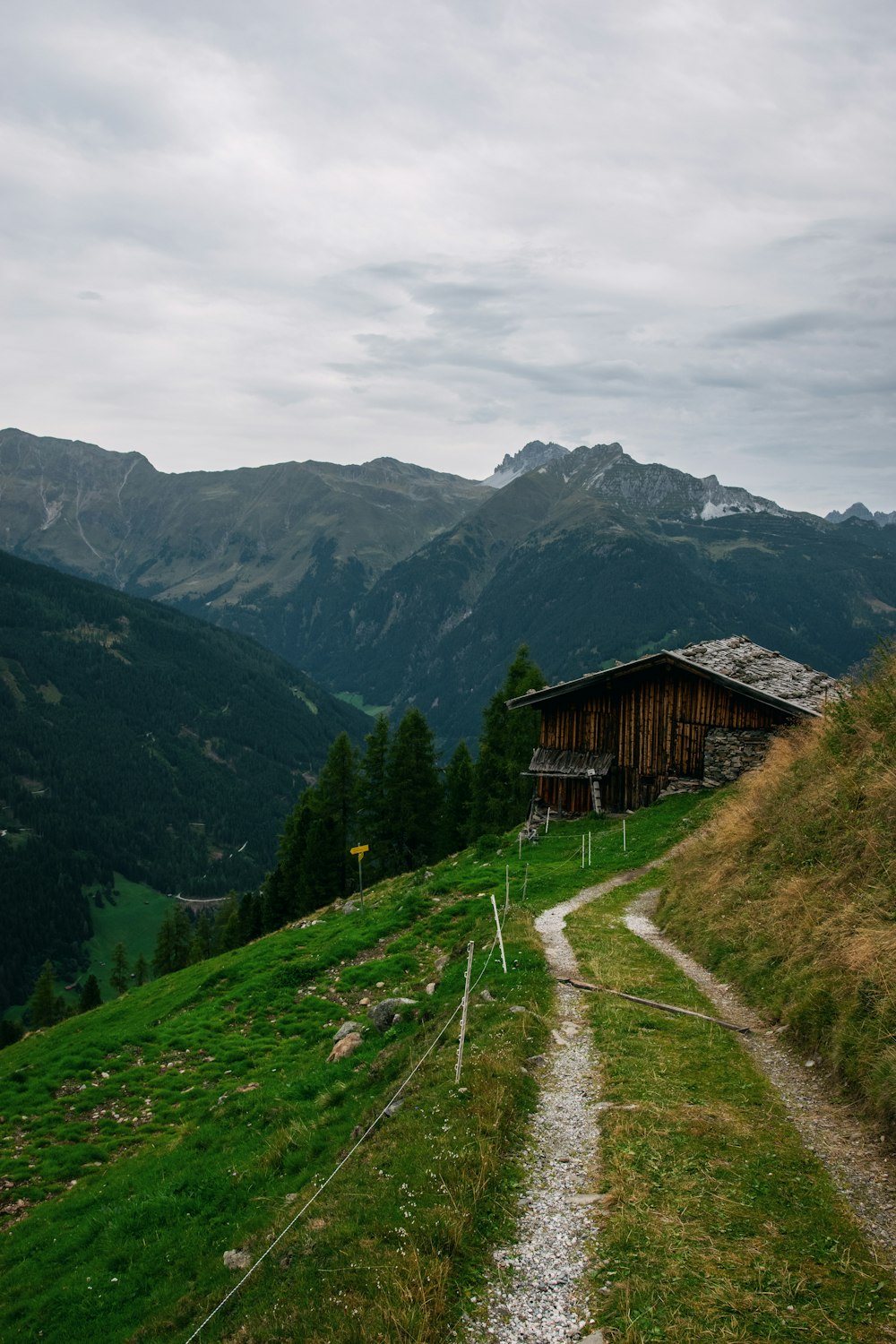 a house with a mountain in the background