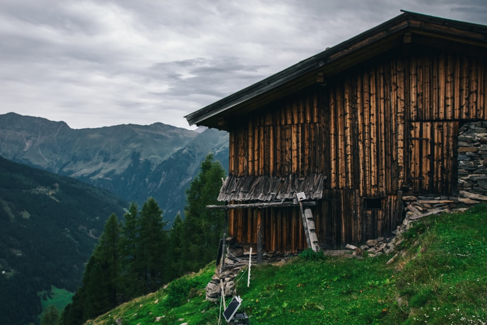 a house with a mountain in the background