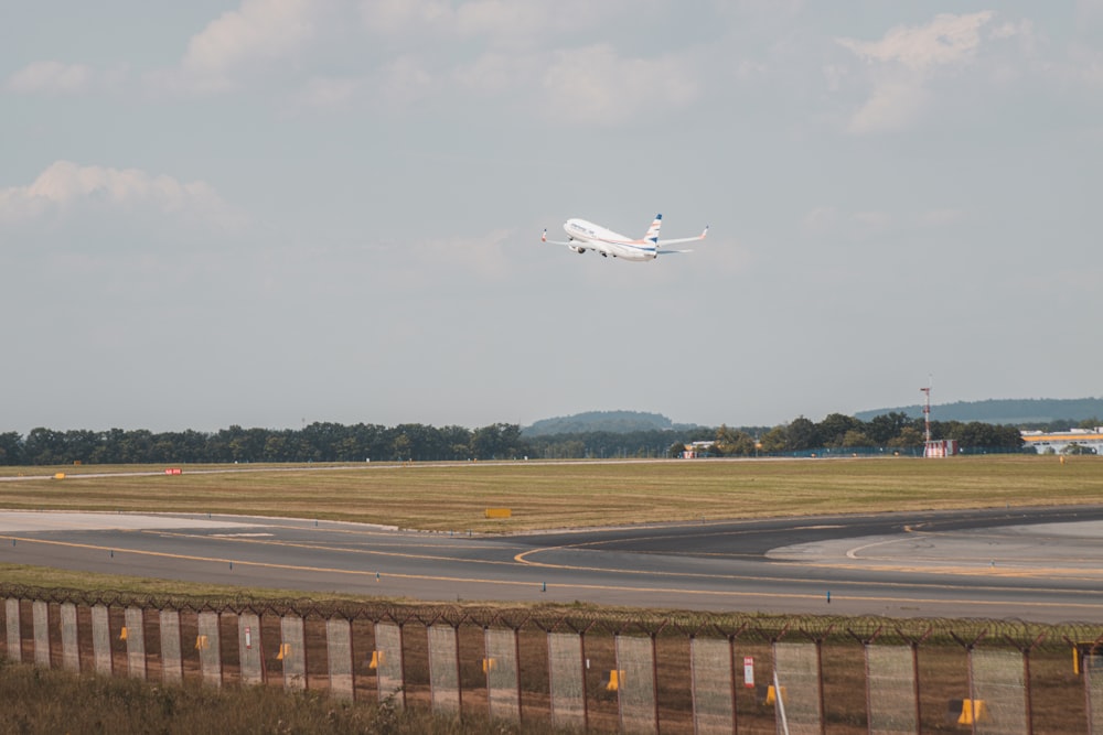 an airplane taking off from a runway