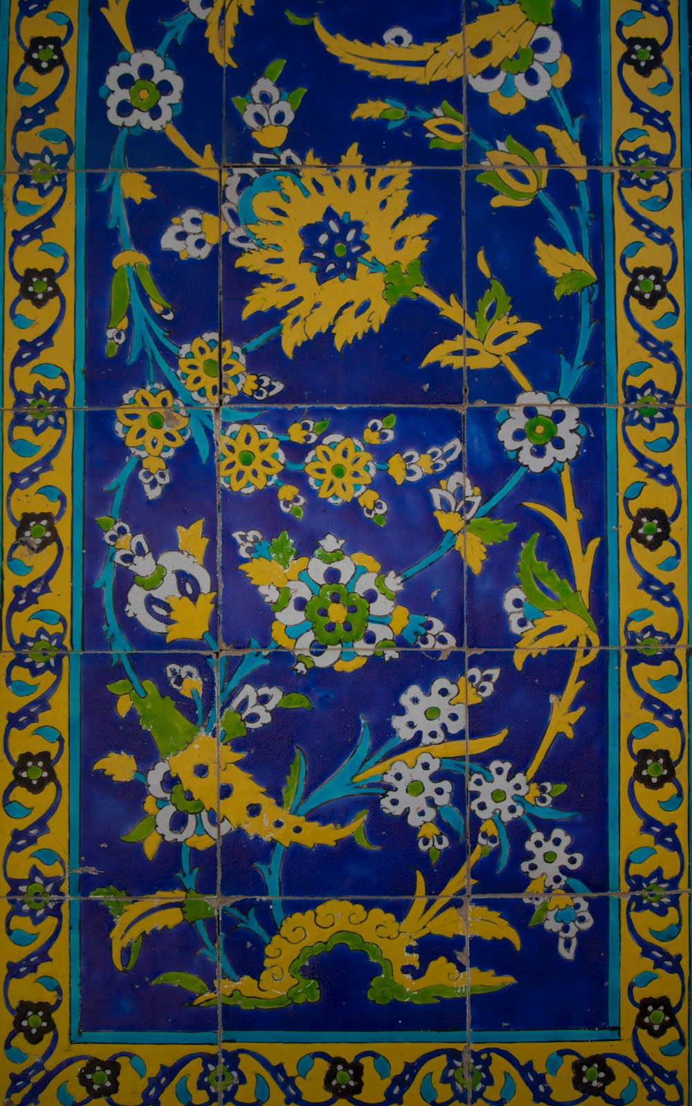 a blue and yellow rug